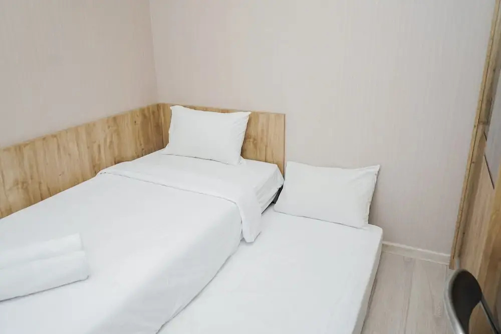 Legok: Cozy and New 2BR at Marigold Nava Park Apartment