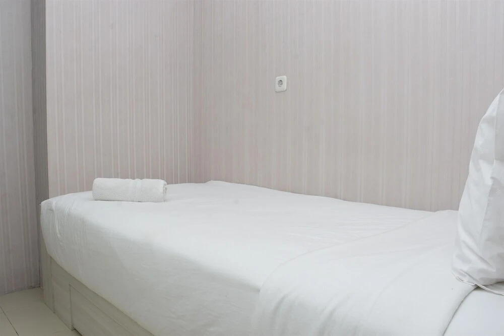 Джакарта: Homey and Comfy 3BR at Bassura City Apartment