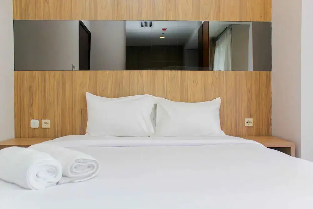 Nice and Enjoy 1BR at Sudirman Suites Apartment — фото 1