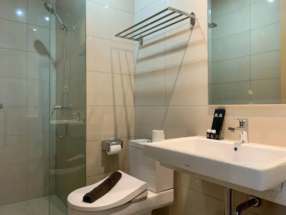 Джакарта: Cozy And High Floor 1Br At Sedayu City Suites Kelapa Gading Apartment