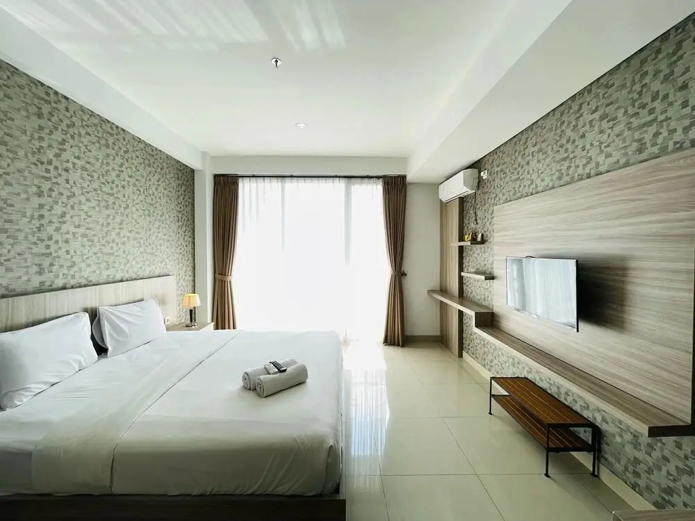 Бандунг: Deluxe Studio Room At Dago Suites Apartment