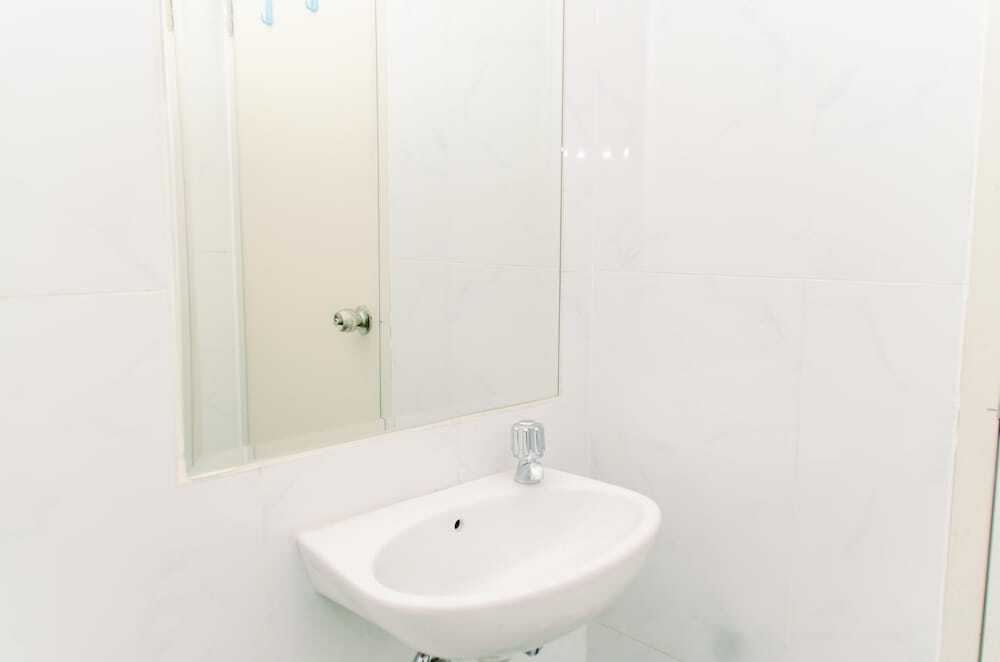 Южный Тангеранг: Tranquil And Warm 2Br Apartment At Urban Heights Residences