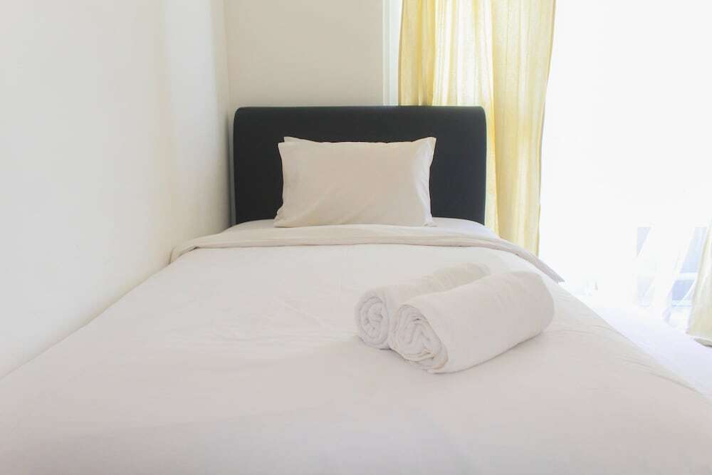Legok: Simply Minimalist Studio at Casa De Parco Apartment