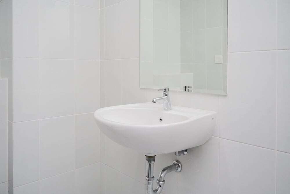 Legok: Elegant and Homey Studio at Casa De Parco Apartment BSD City