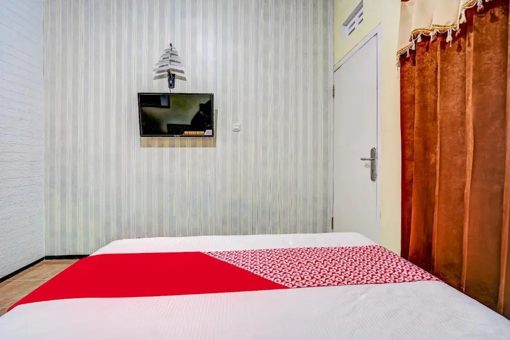 Бату: OYO 90642 Lancar Homestay Syariah