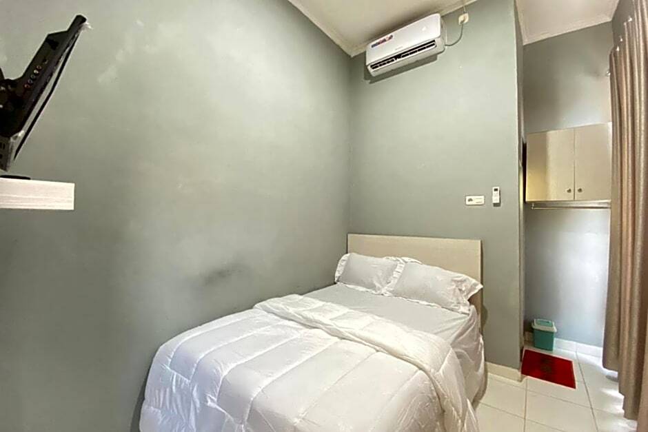Палембанг: Pelangi Guest House Palembang RedPartner
