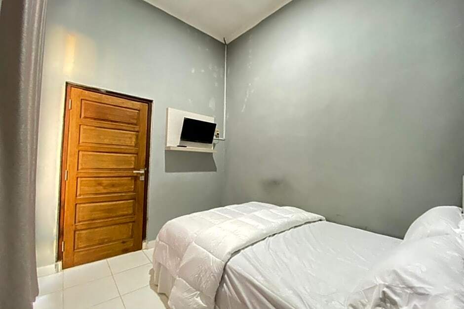 Палембанг: Pelangi Guest House Palembang RedPartner