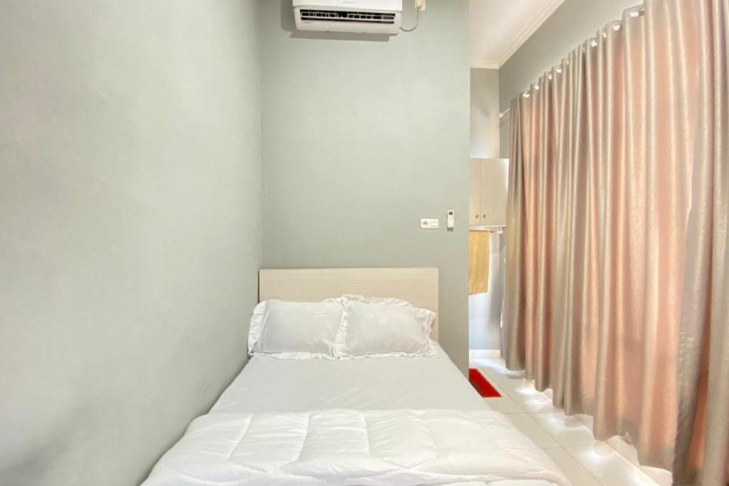 Палембанг: Pelangi Guest House Palembang RedPartner