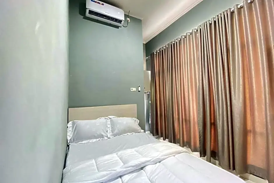 Палембанг: Pelangi Guest House Palembang RedPartner
