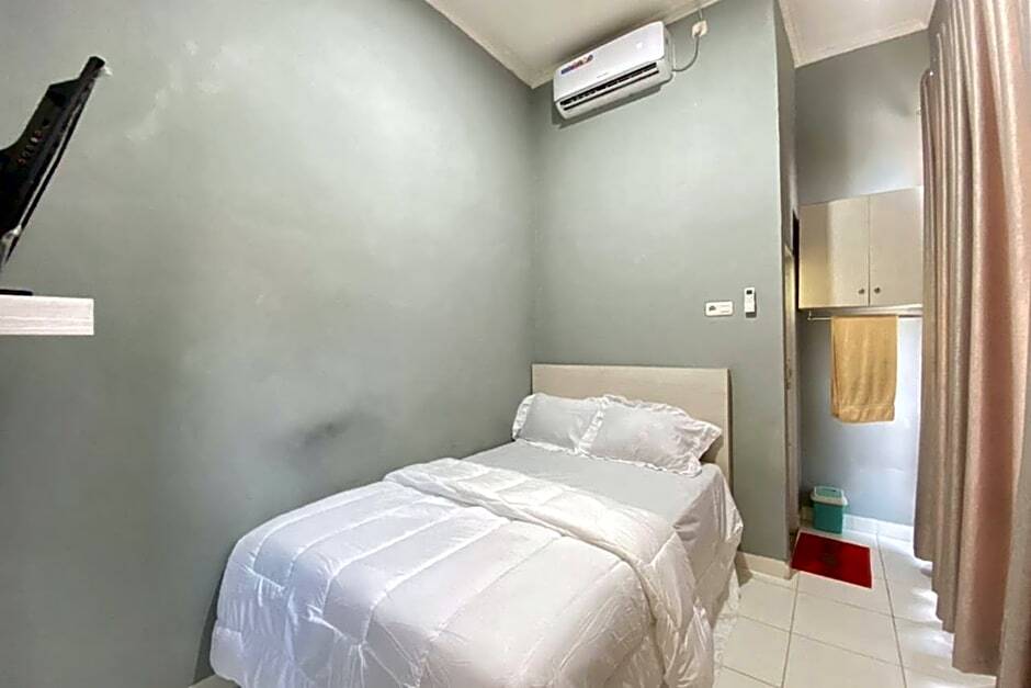 Палембанг: Pelangi Guest House Palembang RedPartner
