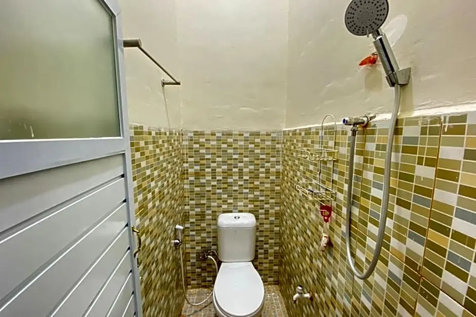 Палембанг: Pelangi Guest House Palembang RedPartner