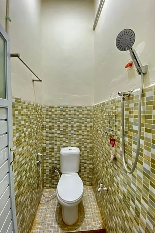 Палембанг: Pelangi Guest House Palembang RedPartner