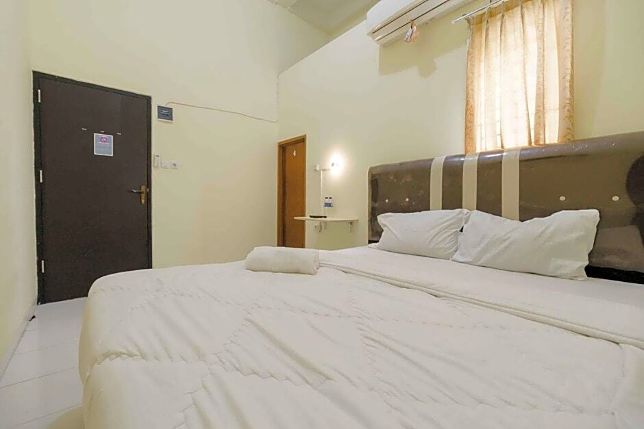 Палембанг: to RedDoorz near Opi Mall Palembang 2