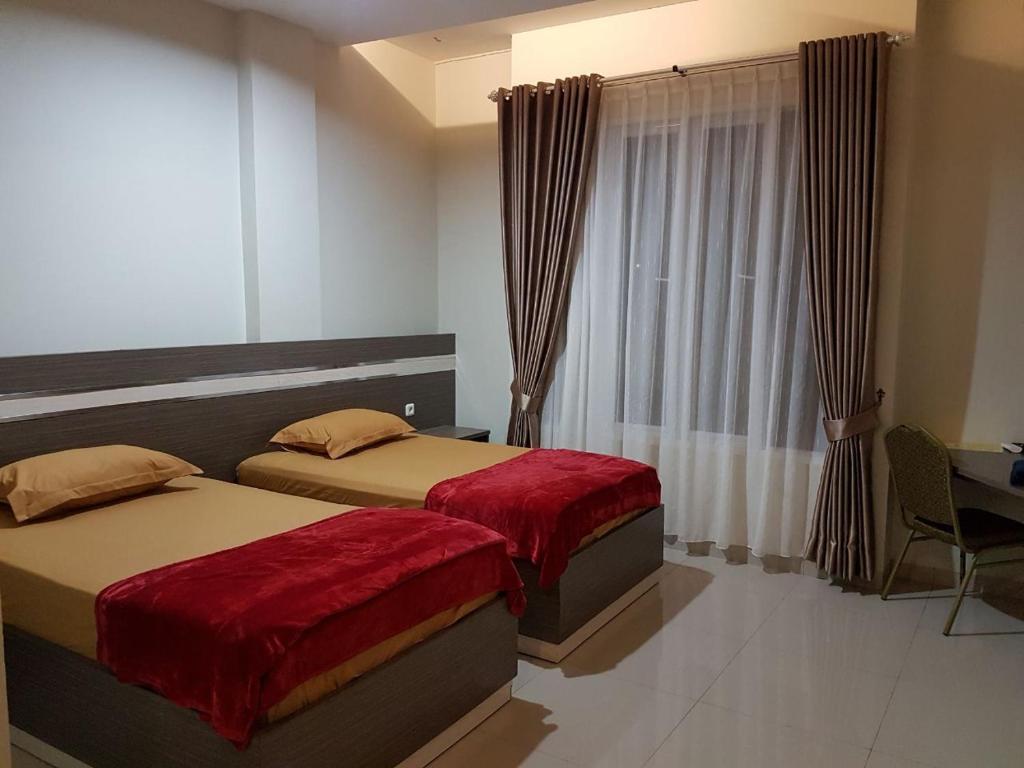 Лахат: Hotel Grand Sigma