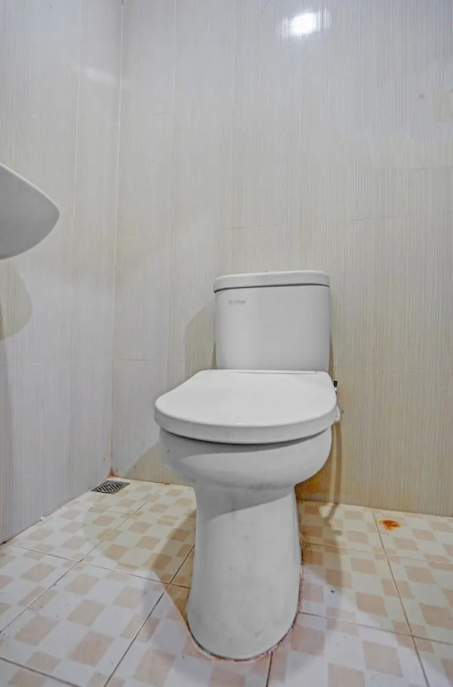 Сурабая: OYO Flagship 90789 Genteng Residence