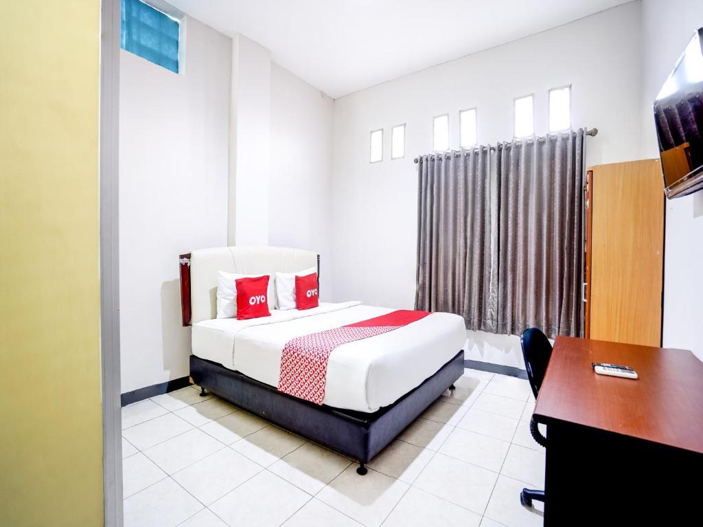 Сурабая: OYO Flagship 90890 Bratang Gede Residence