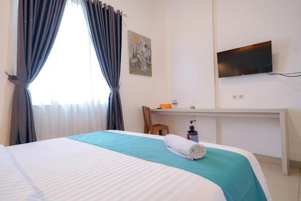 Палембанг: OYO Life 1299 Balcony Orange Homestay