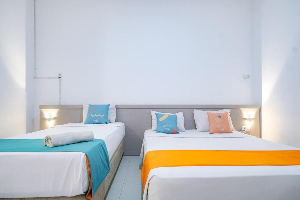 Палембанг: OYO Life 1299 Balcony Orange Homestay