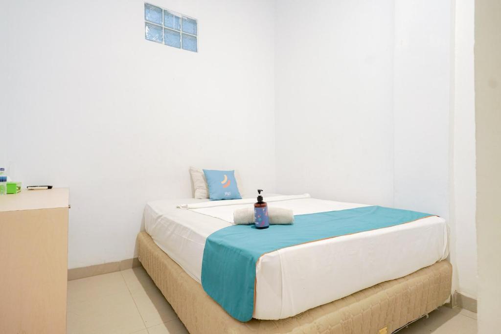 Палембанг: OYO Life 1299 Balcony Orange Homestay
