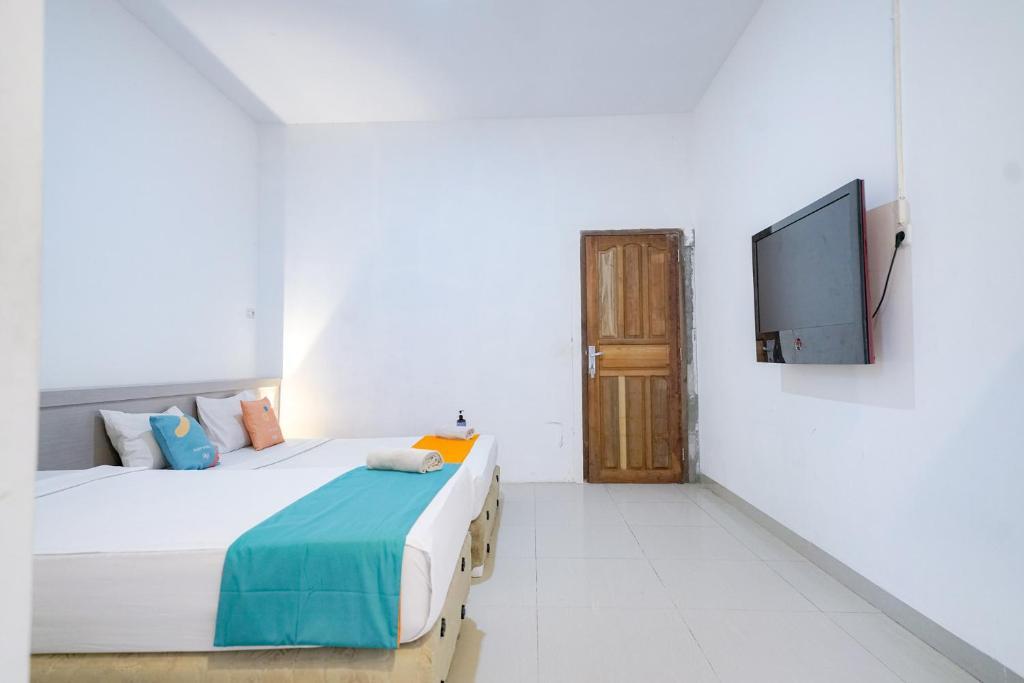 Палембанг: OYO Life 1299 Balcony Orange Homestay