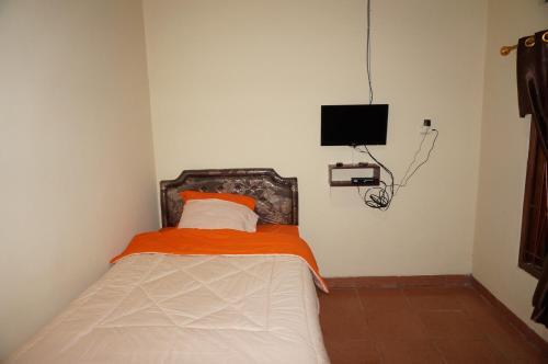 Каласан: QQ Guesthouse