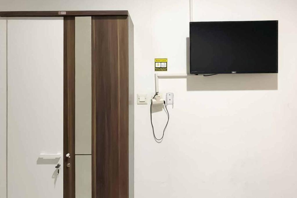 Сурабая: SAS Guest House RedPartner @ Darmo Park 2 Surabaya