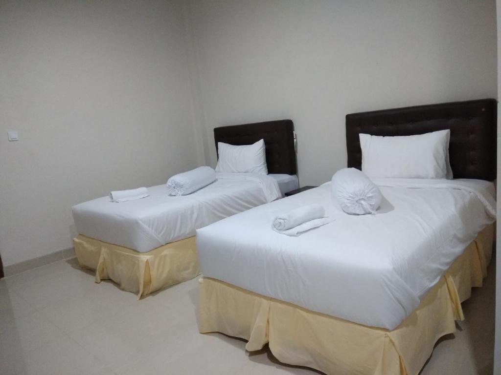 Рутенг: Victory Hotel