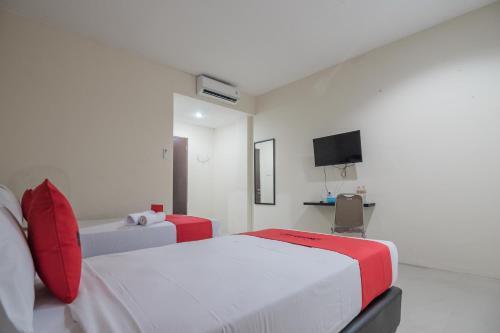 Мартапура: Reddoorz Plus Near Syamsudin Noor Airport