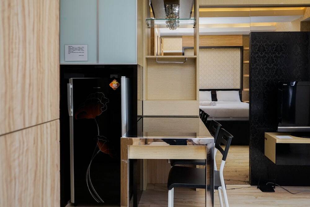 Legok: Cozy 1BR Scientia Residence Apartment near Summarecon Mall Gading Serpong By Travelio