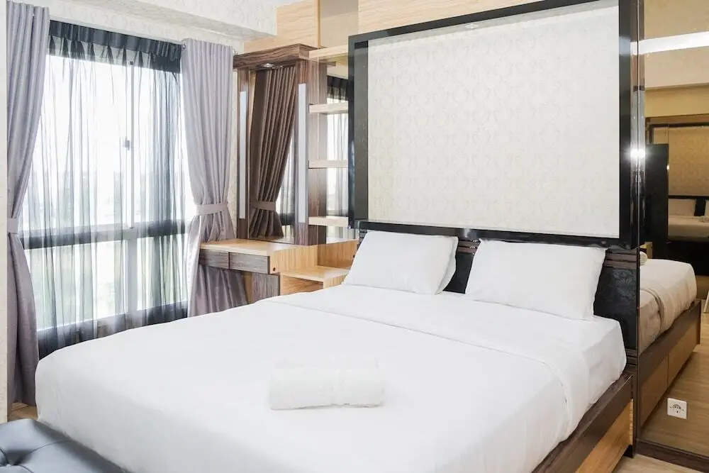 Legok: Cozy 1BR Scientia Residence Apartment near Summarecon Mall Gading Serpong By Travelio