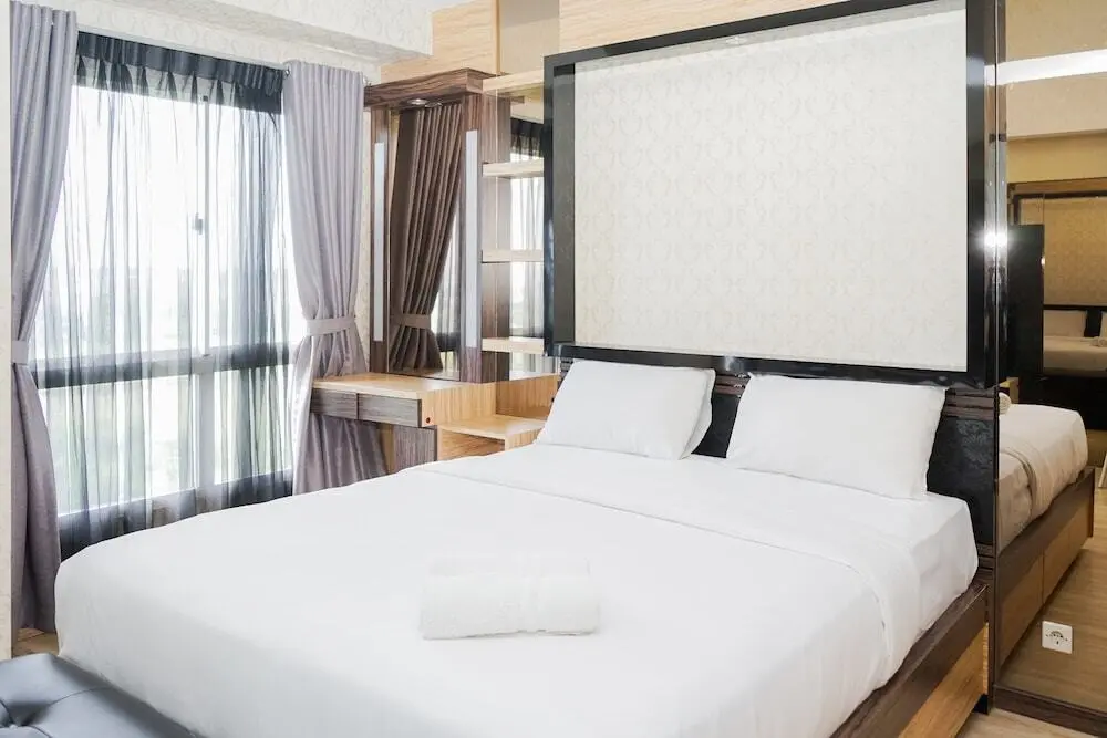 Legok: Cozy 1BR Scientia Residence Apartment near Summarecon Mall Gading Serpong By Travelio