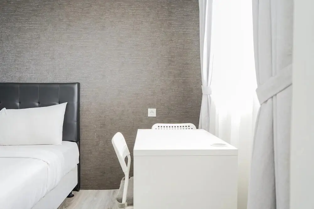 Compact and Monochrome Studio Room Bintaro Icon Apartment — фото 1