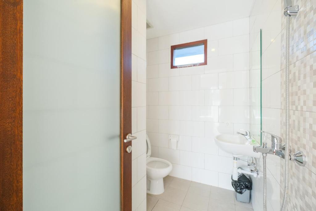 Кута: Dharma Guest House RedPartner