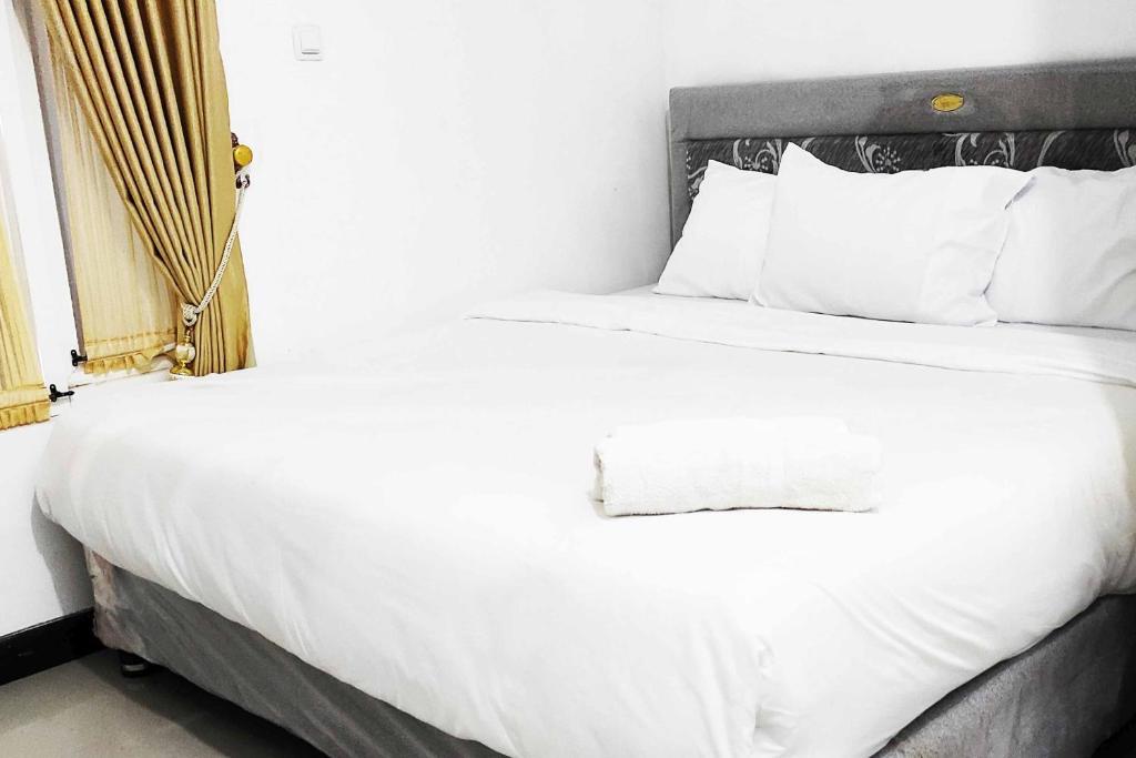 Бату: Pertiwi Homestay Near Museum Angkut Batu Mitra RedDoorz