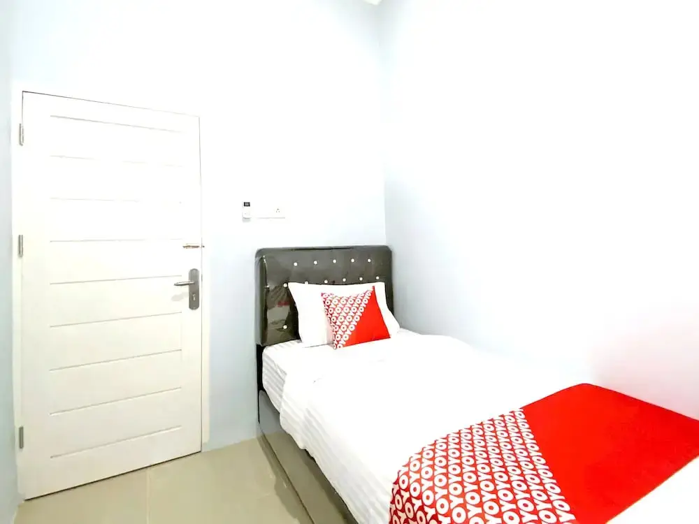 Паданг: Guesthouse Pagi Sore Syariah by OYO Rooms