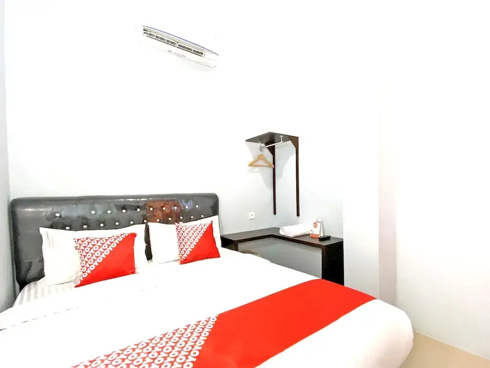 Паданг: Guesthouse Pagi Sore Syariah by OYO Rooms