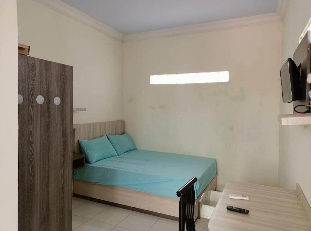 Моджокерто: OYO 91332 City-m Urban Homestay Syariah