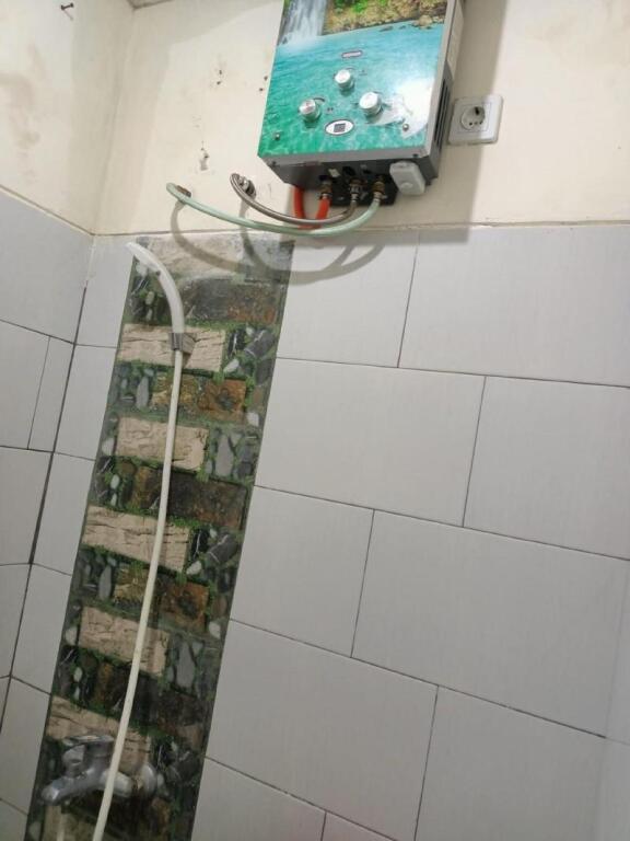 Моджокерто: OYO 91332 City-m Urban Homestay Syariah