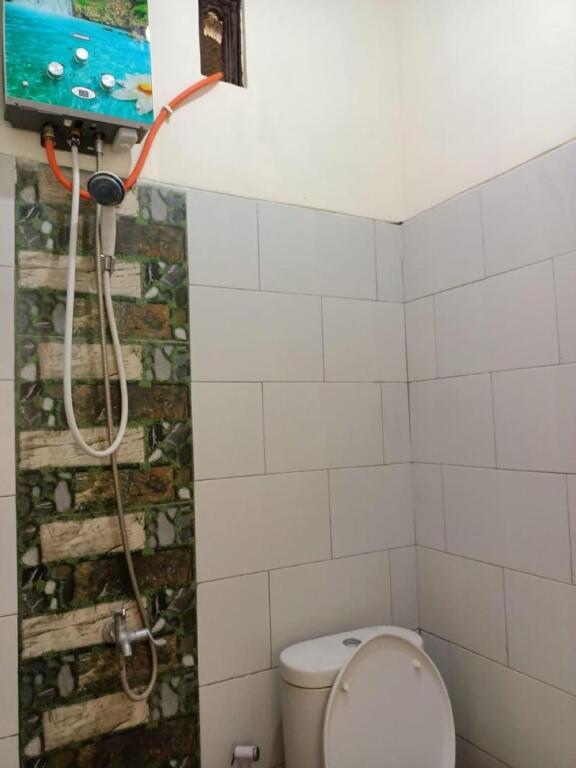 Моджокерто: OYO 91332 City-m Urban Homestay Syariah