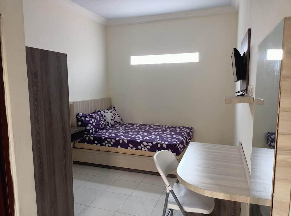 Моджокерто: OYO 91332 City-m Urban Homestay Syariah