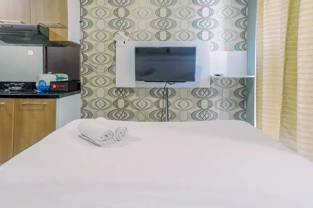 Сурабая: Cozy Living Studio Room Apartment at Tamansari Papilio