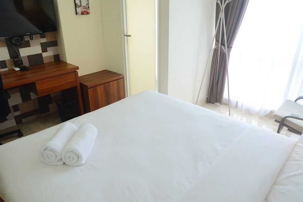 Warm and Best Studio Menteng Park Apartment — фото 1
