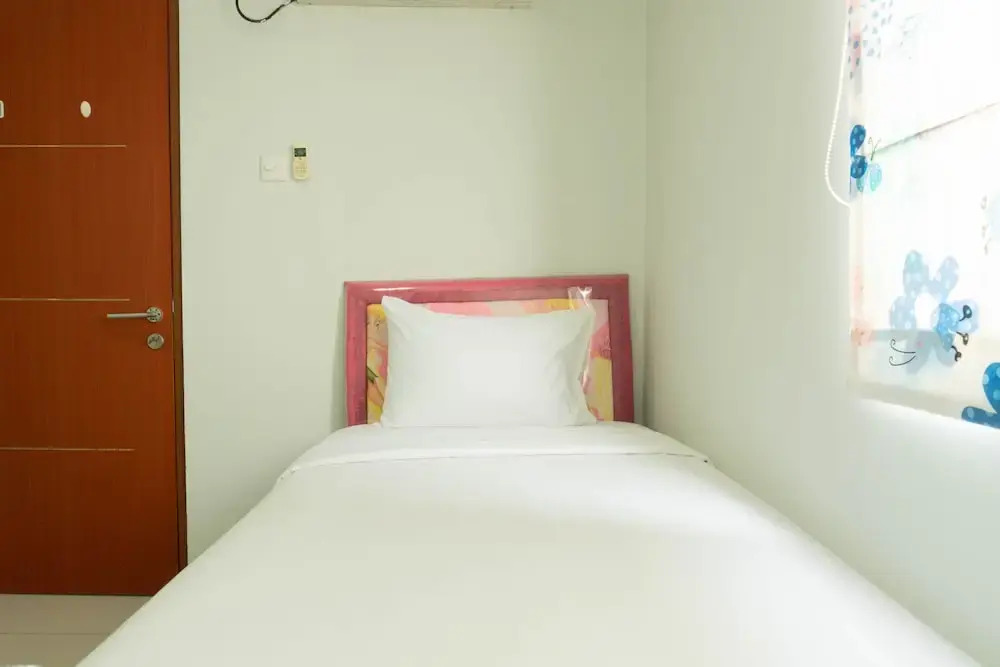 Джакарта: Spacious and Homey 2BR Green Central City Apartment