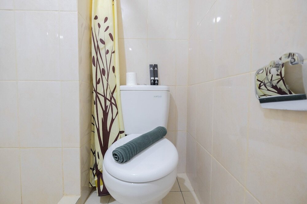 Бекаси: Modern White Studio At Springlake Summarecon Bekasi Apartment By Travelio