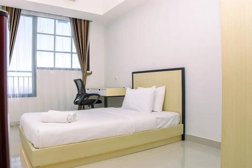 Депок: Elegant Studio with Single Bed at Evenciio Margonda Apartment