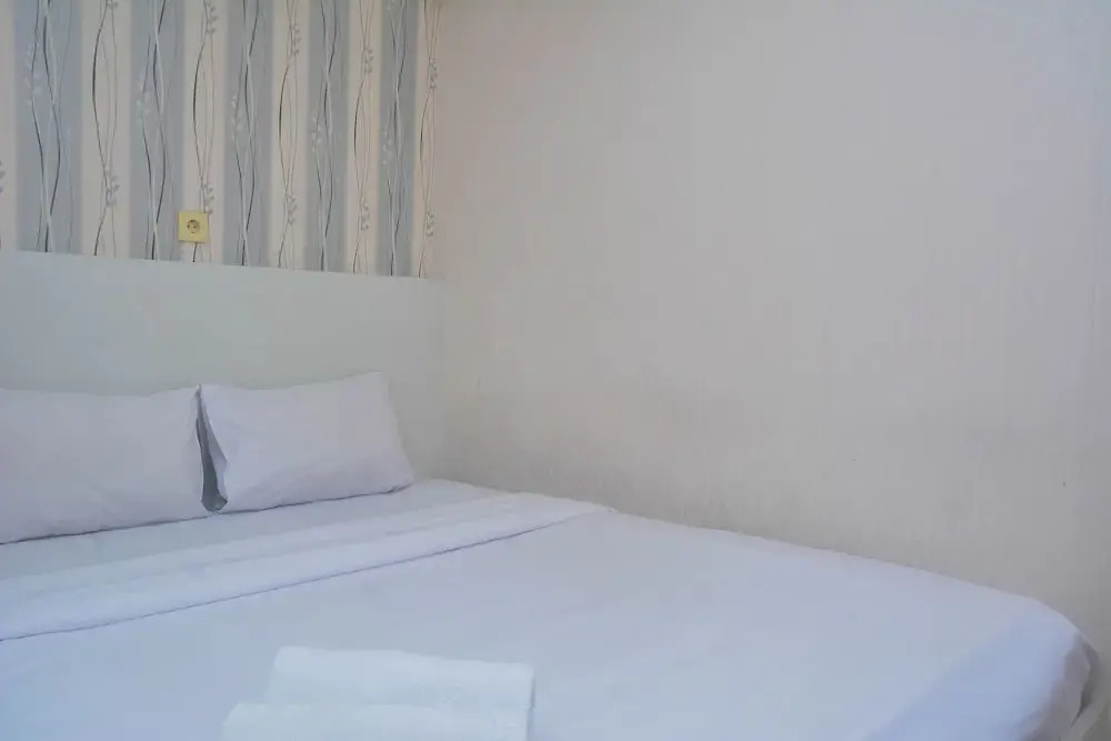 Джакарта: Minimalist And Warm 2Br At Bassura City Apartment