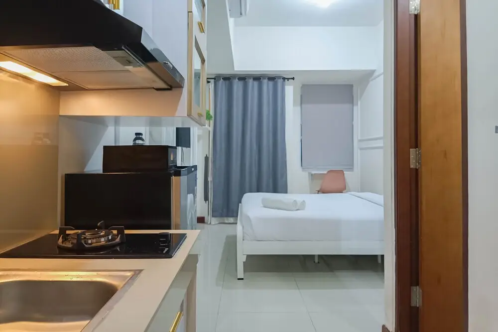Макассар: White And Cozy Studio At Vida View Makassar Apartment