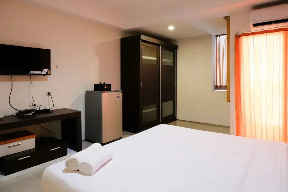 Сурабая: Cozy And Homey Studio Apartment At High Point Serviced