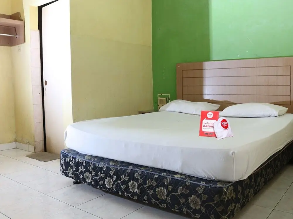 Петумбак: Nida Rooms Pasar Buah Medan Tuntungan