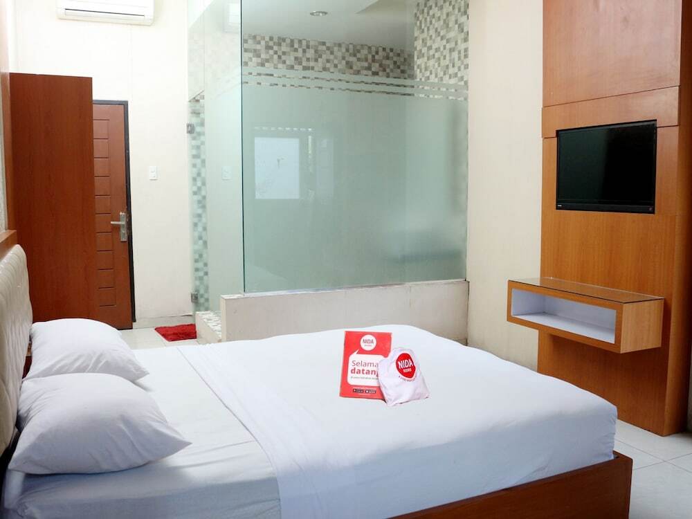 Петумбак: Nida Rooms Pasar Buah Medan Tuntungan